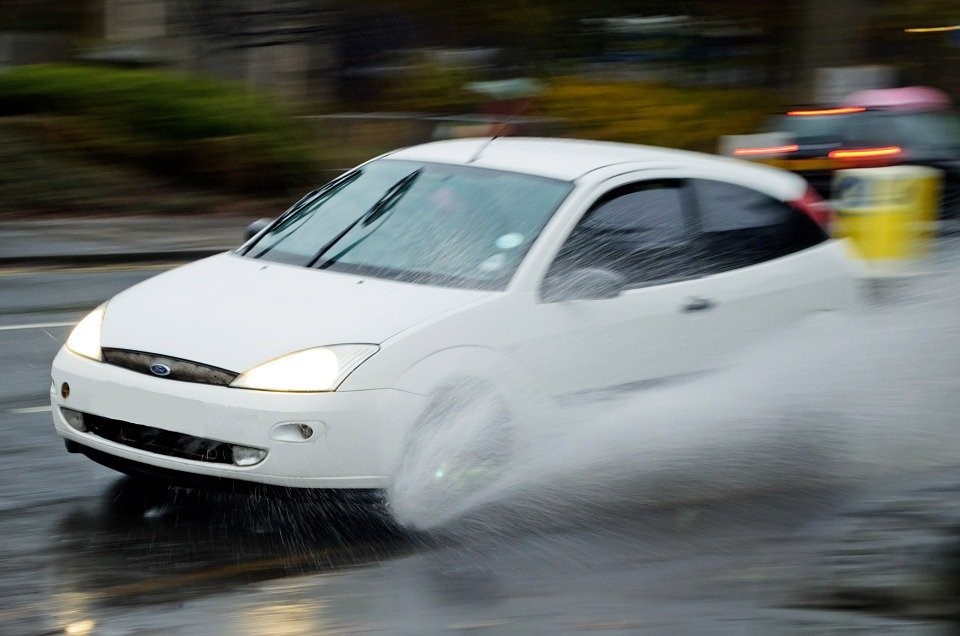 CAR DRIVING IN RAIN