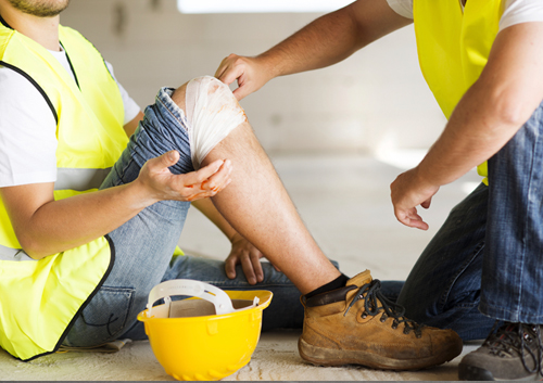 Person Helping Injured Worker