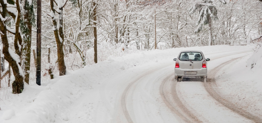 Car Driving to the Store in Winter