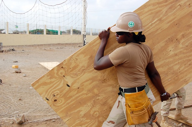 A woman working on a construction site.